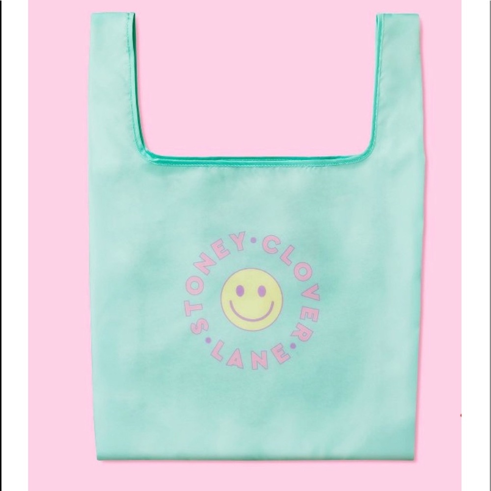 Stoney clover lane reusable foldable tote. Mint green color with smiley logo